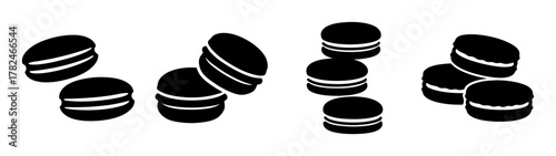 A collection of black and white graphic illustrations of sandwich cookies, with cream filling, arranged in small groups on a