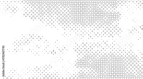 Dynamic halftone design with varying circle sizes fades from dense patterns to scattered dots on a clean white backdrop, creating a minimalist and modern visual effect