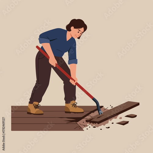 A person uses a tool to pry up a board from a deck, showcasing DIY work in progress