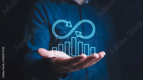 Wallpaper Mural Innovative business growth presented with a glowing chart and endless loop in hand, representing sustainable success and continuous improvement Torontodigital.ca