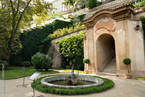 Prague, Czech Republic – August 6, 2025: Historic baroque fountain in Great Palffy Garden (Velká Pálffyovská zahrada) beneath Prague Castle, Malá Strana, Prague, Czech Republic, on sunny summer day