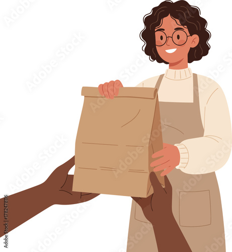 Young woman with curly hair and glasses preparing to serve food with a warm smile against a dark