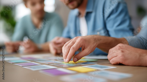Web design team using card sorting for UX, tech innovation in user experience, coding culture in design collaboration, software solutions in wireframing, UI tech , World Coding Day