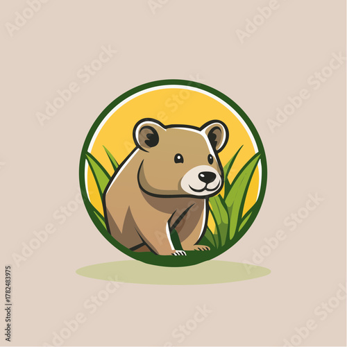 Bear cub in grass with yellow circle background