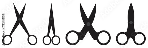 Set of various black scissor silhouettes.