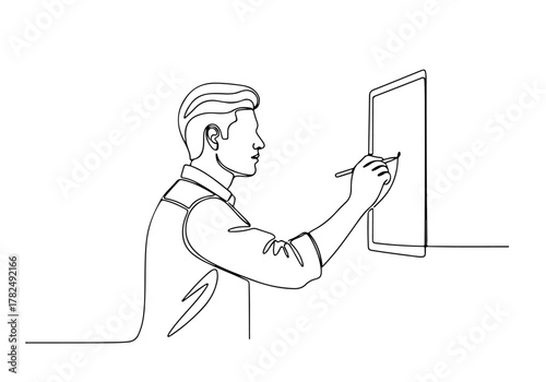 Dynamic continuous line drawing of a creative man working on a digital tablet, showcasing modern design and artistic workflow