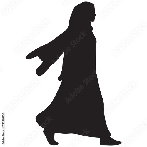 Elegant silhouette of a woman walking, symbolizing Islamic culture, modest fashion, and cultural diversity, ideal for promoting understanding and respect