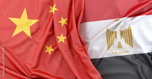 Flags of China and Egypt lying together. 3D rendering