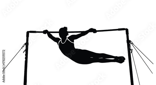 Silhouette of a male gymnast performing on a horizontal bar, , demonstrating strength and control