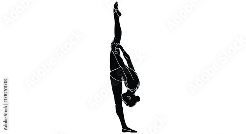 Silhouette of a gymnast performing a vertical split for artistic and athletic representation