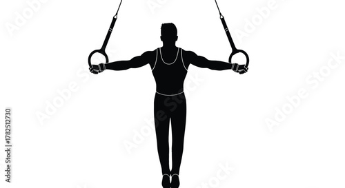Silhouette of a gymnast performing on still rings, a strength and balance exercise, the rings are suspended