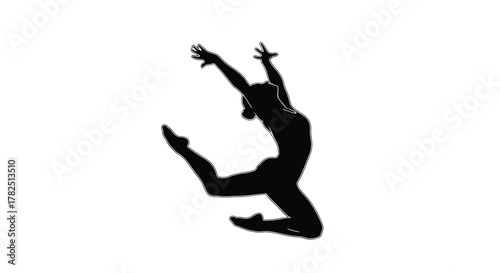 Silhouette of a gymnast performing a jump athletic woman in midair during a gymnastic routine