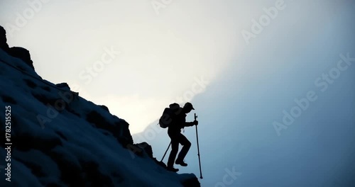 man on the top of the mountain