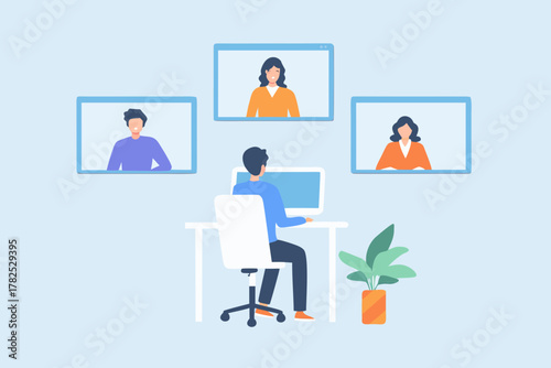 Man participating in a video conference call with colleagues working remotely from home