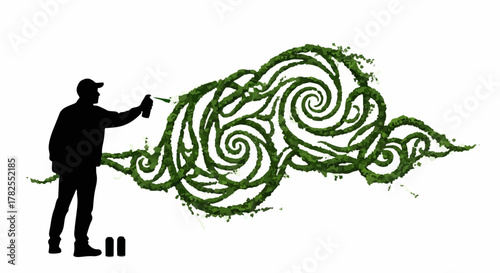Artist sprays green vines creating organic swirling art against white background