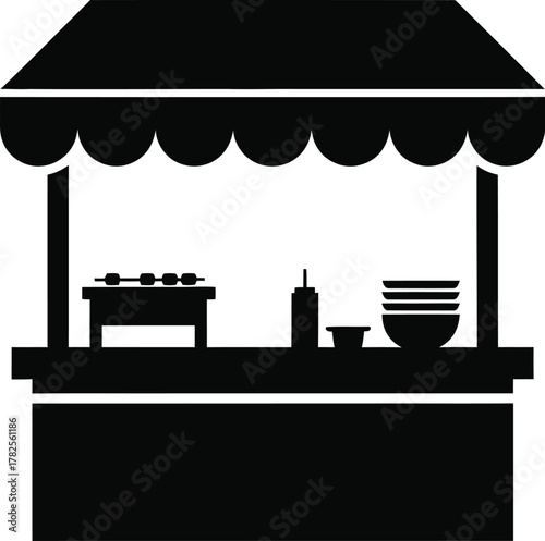 Silhouette of a food stall with serving items