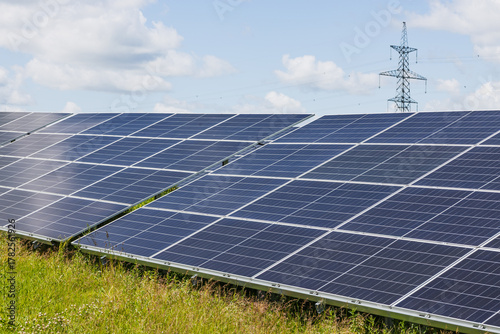 Utility scale solar farm with photovoltaic panels generating clean renewable energy
