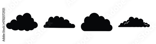 Collection of four black silhouette clouds different shapes and sizes abstract weather elements