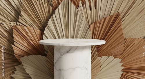 White marble pedestal with round top against dried palm leaves background