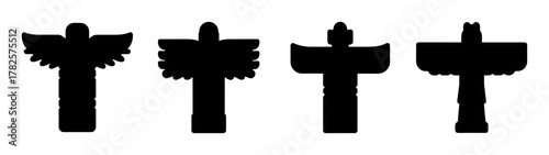 Four stylized black totem pole silhouettes arranged horizontally showing distinct cultural carvings