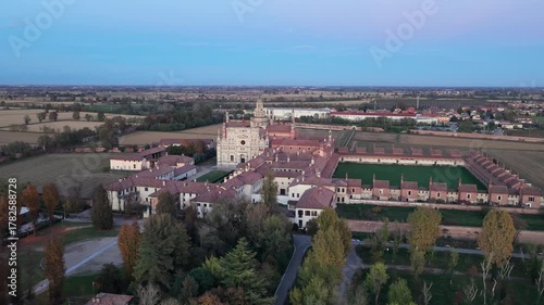 Certosa di Pavia aerial view at evening  Gra-Car (Gratiarum Carthusia, Monastery of Santa Maria delle Grazie - Sec. XIV),Pavia, Italy.