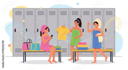 Three young women in towels are in a bright locker room, one is using a phone, one is holding a t-shirt, and another is waving.