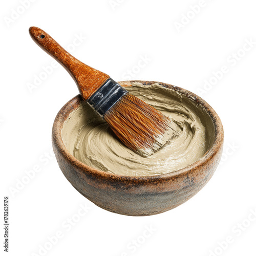 Mixing Clay in a Textured Bowl With a Brush for Creative Art Projects