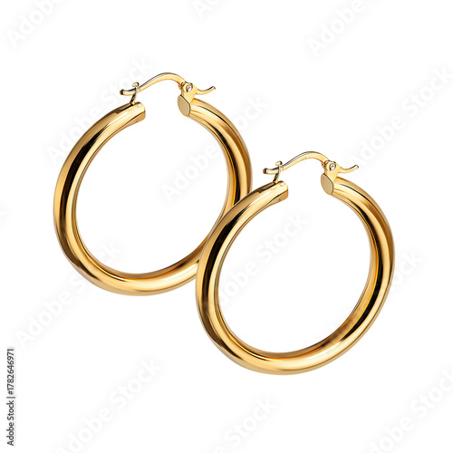 Elegant Golden Hoop Earrings Shining Under Bright Light in a Close-Up View
