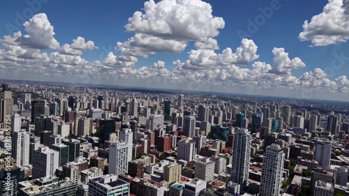 Dynamic urban skyline under vibrant clouds in a metropolitan panorama