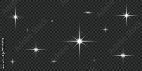 Vector set of realistic white starbursts and lens flare effects.