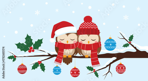 Two cute pixelated owls wearing santa hats and scarves sit on a snowy branch with ornaments.