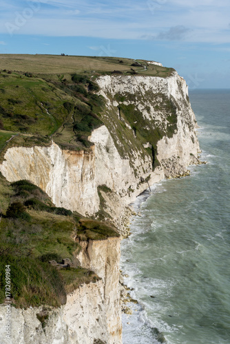 White Cliffs of Dover in Dover, Kent, England. The White Cliffs of Dover are the region of English coastline facing the Strait of Dover and France.