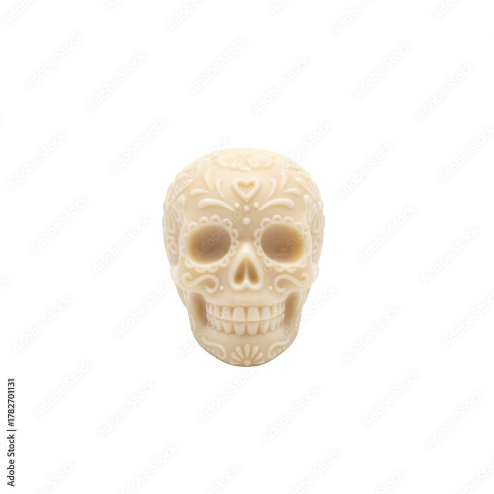 Fototapeta premium Day of the Dead, A decorative sugar skull figurine intricately adorned with floral patterns