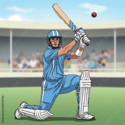 Intense batsman in blue uniform kneels, poised to strike the approaching red cricket ball