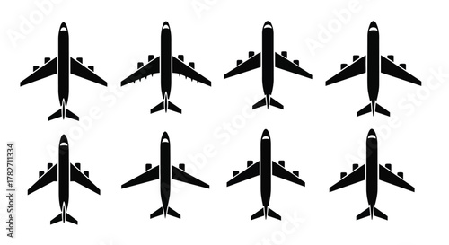 Simple black silhouettes of commercial airplanes arranged in a grid pattern