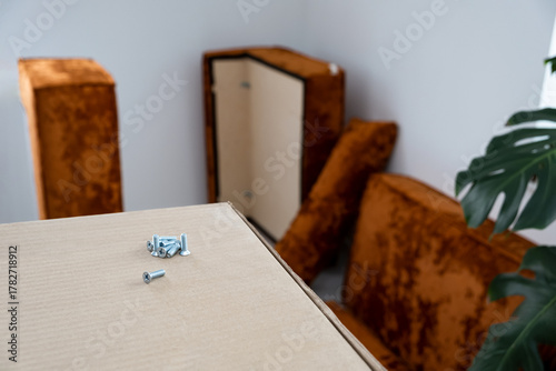 assembling modern furniture sofa, couch at home, DIY lifestyle and cozy interior vibes