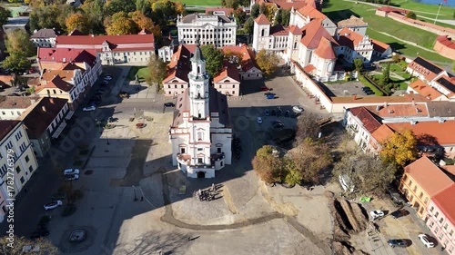 Kaunas, Lithuania – October 17, 2024: Aerial view of Kaunas Town Hall Square during renovation with paving replacement, construction workers and equipment visible in the old town public space.