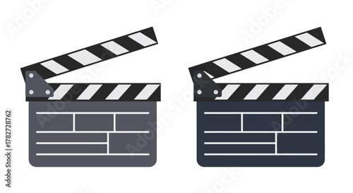 Two film clapperboards in different shades of blue isolated on white