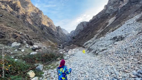 child is hiking in a mountain gorge