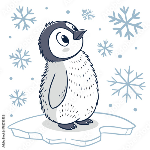 Cute baby penguin standing on an ice floe