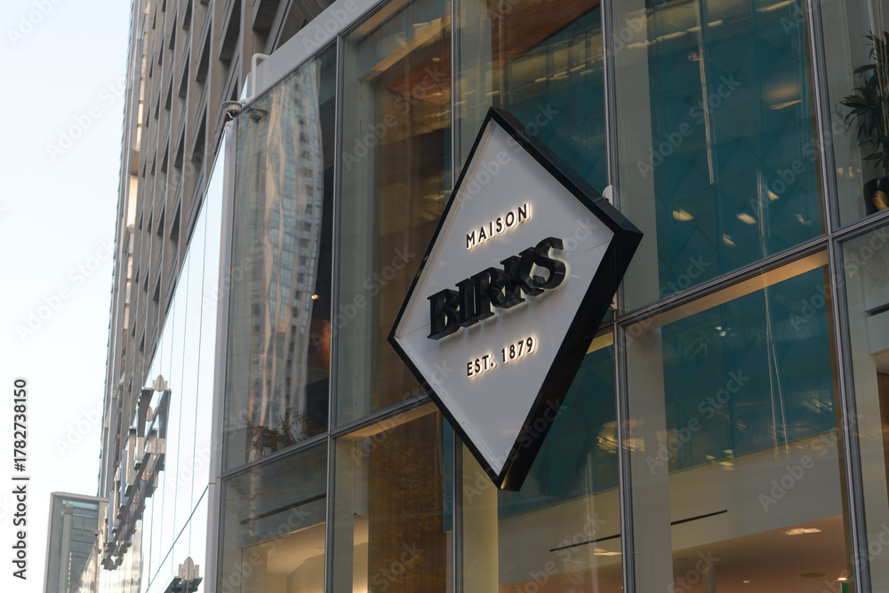 Obraz premium exterior building facade and sign of Maison Birks, a jewelry store, located at 55 Bloor St W, Unit 152, inside Manulife Centre, Toronto