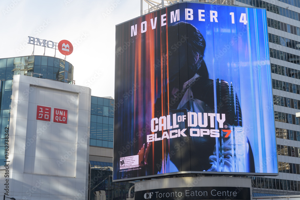 Naklejka premium digital billboard for Call of Duty: Black Ops 7 developed by Treyarch & Raven Software on display at CF Toronto Eaton Centre, Sankofa Square, Toronto