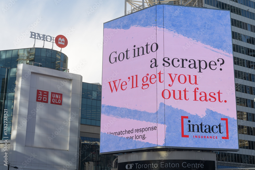 Fototapeta premium intact insurance ad facing Sankofa Square, Toronto