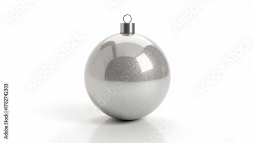 Single Silver Christmas Ornament with Reflective Surface and Hanging Loop on White Background Showcasing Elegant Holiday Simplicity
