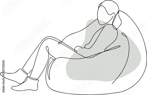 Person relaxing in beanbag chair sitting