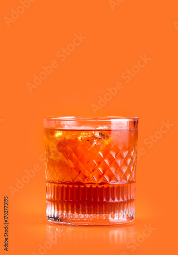 classic red orange drink with contreau base isolated on orange background