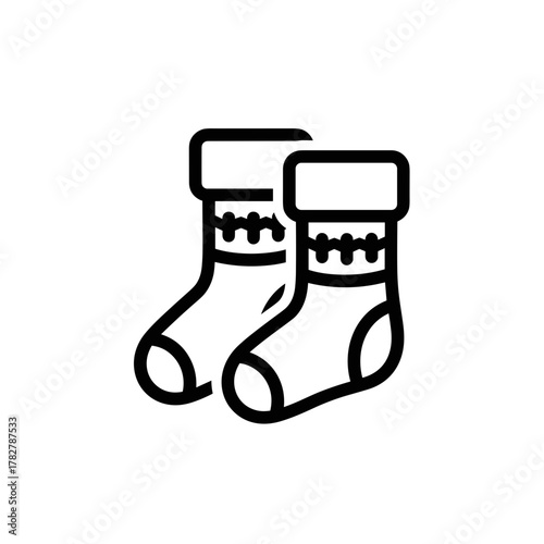 Pair of cozy knitted socks with folded cuffs on white background  