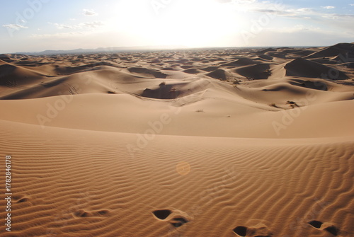 Sand dunes in the Sahara Desert at amazing sunrise in Morocco