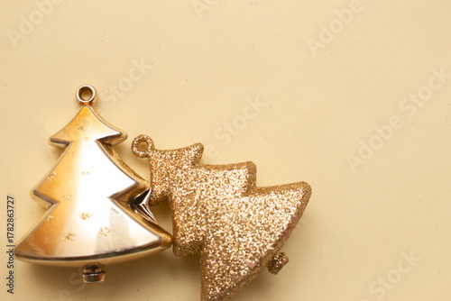 Golden Christmas ornaments on a colorful background