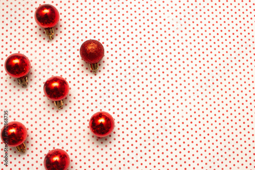 Golden Christmas ornaments on a colorful background